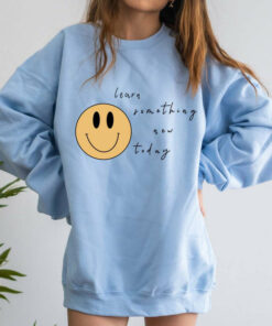 blue smiley face sweatshirt