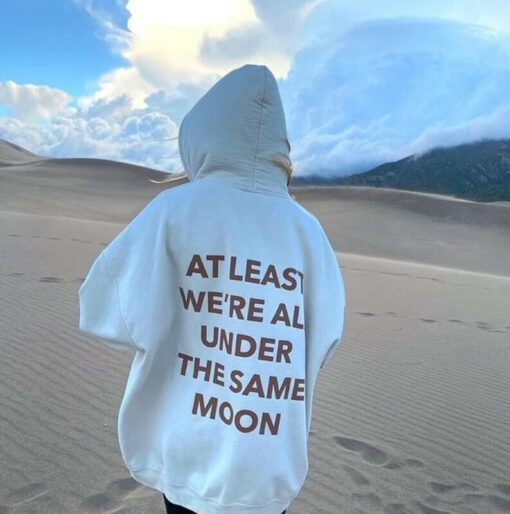 at least we're all under the same moon hoodie